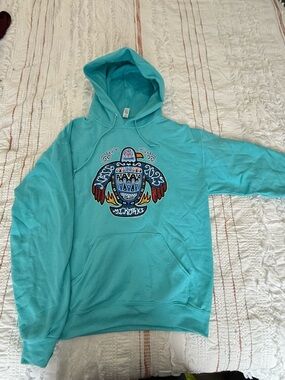 Turquoise Graphic Hoodie with Colorful Turtle Motif